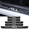 Black carbon fiber door sill protector featuring a custom silver Soul logo design.