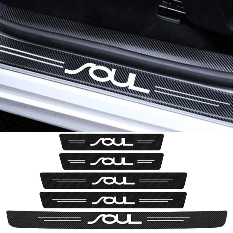 Black carbon fiber door sill protector featuring a custom silver Soul logo design.