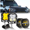 A set of powerful LED auxiliary driving lights mounted on a truck, showing the product in detail.
