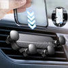 Support de téléphone noir pour expansion gravitationnelle, installé dans le conduit d'air d'une voiture avec un smartphone af