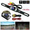 A black HD wired backup camera with 7 IR LEDs showing day and night vision footage.