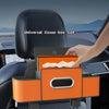 An orange tissue box organizer is placed on the back seat of a car, held by a hand.