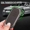 A hand holds a black key fob cover designed to protect and allow signal transmission for Kia vehicles.