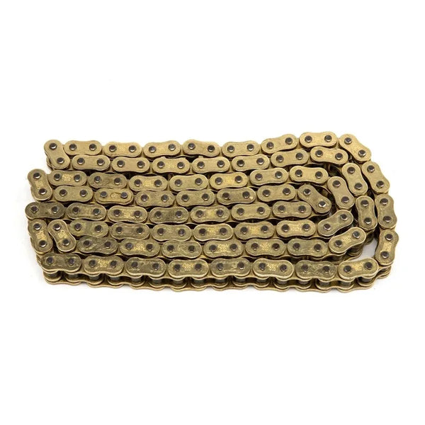 A close-up view of a heavy-duty brass motorcycle chain with multiple sized links.