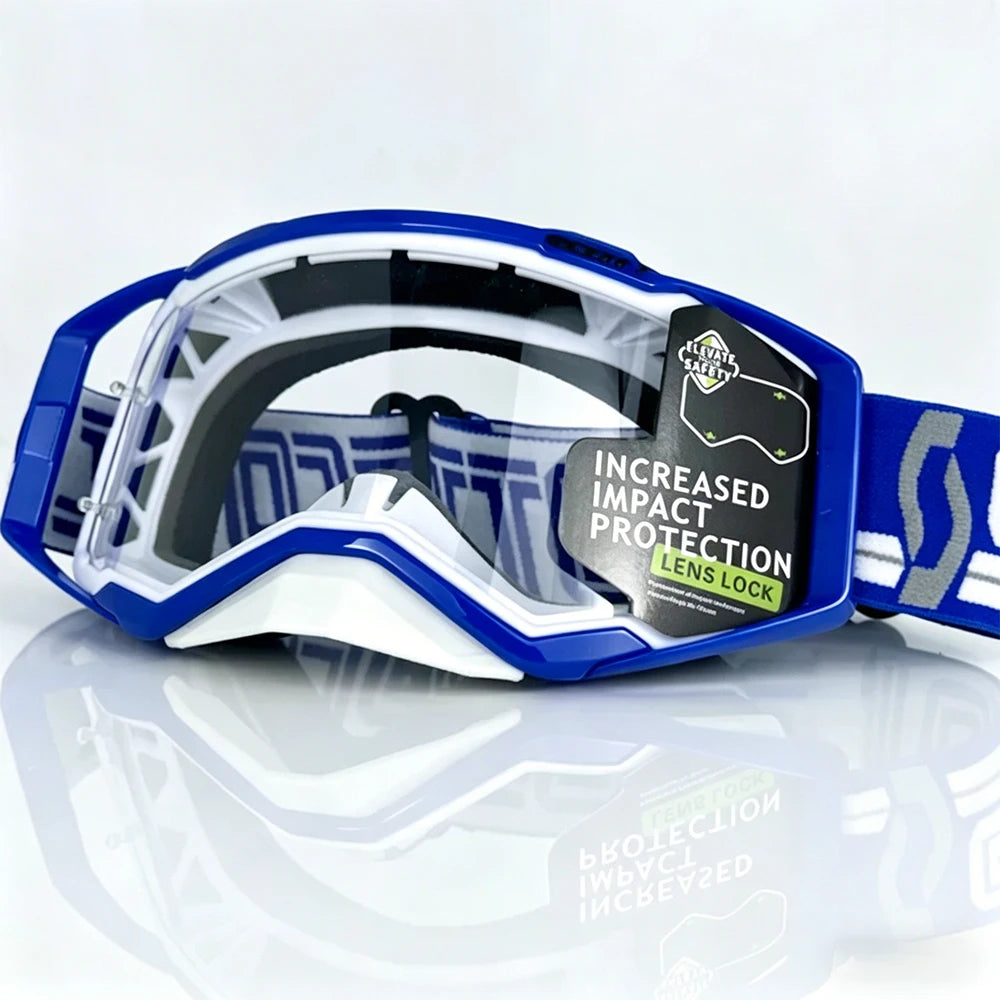 Blue and white safety goggles with a lens lock feature resting on a reflective surface.
