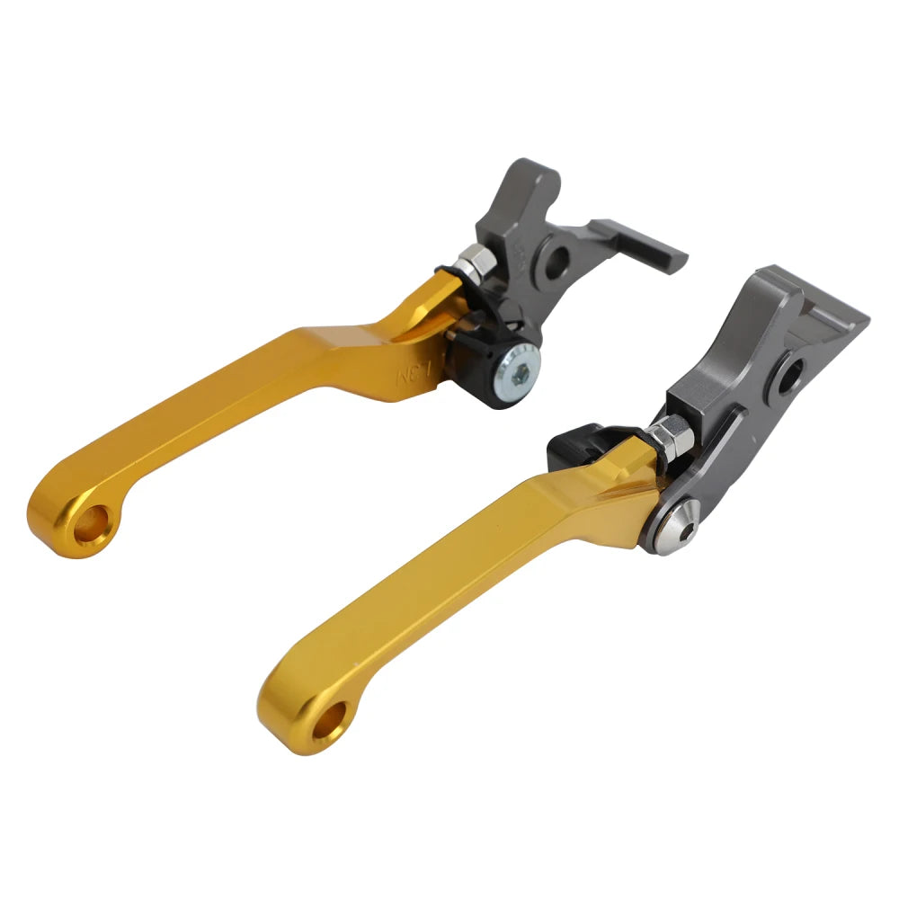 A pair of motorcycle brake and clutch levers for a Surron Ultrabee, featuring gold and silver components.