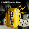 A yellow vibration alarm device is attached to a disc brake lock for motorcycles or scooters.