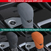 A close-up view of a silicone gear shift cover in gray and orange colors for a Nissan Sentra Altima Patrol Versa vehicle.