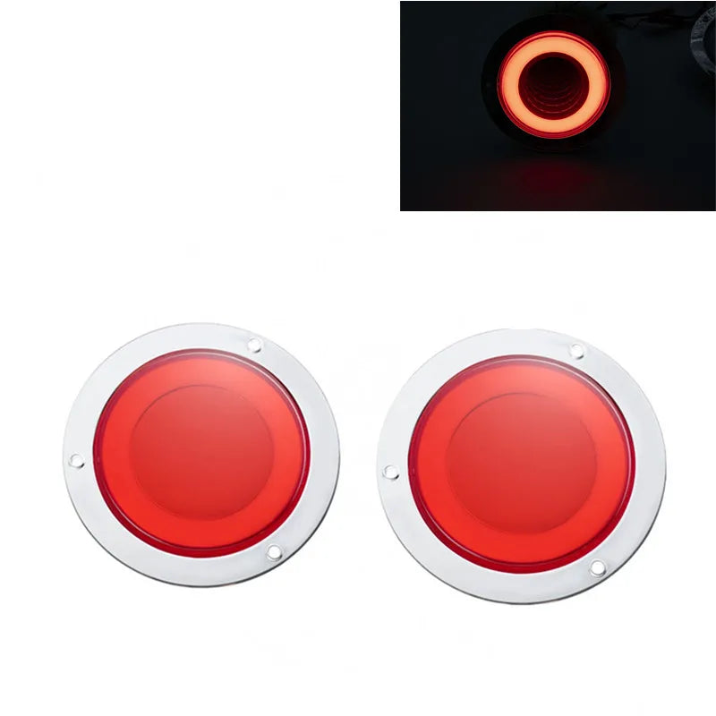 A pair of round red LED truck tail lights with a 3D halo effect.