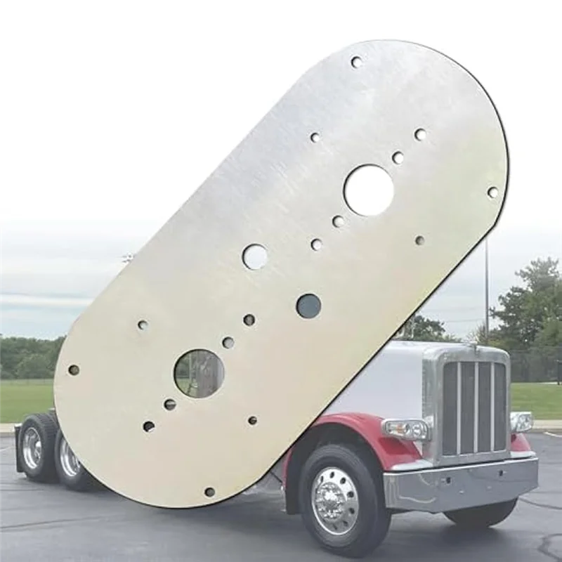 Un support de phares lourd en argent est monté sur un châssis de camion rouge.