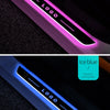 Close-up of a custom logo projector door sill light displaying the word LOGO in pink purple and ice blue colors.