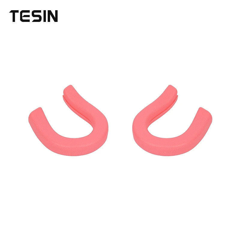 A pair of pink universal car exterior bumper tow hook covers.
