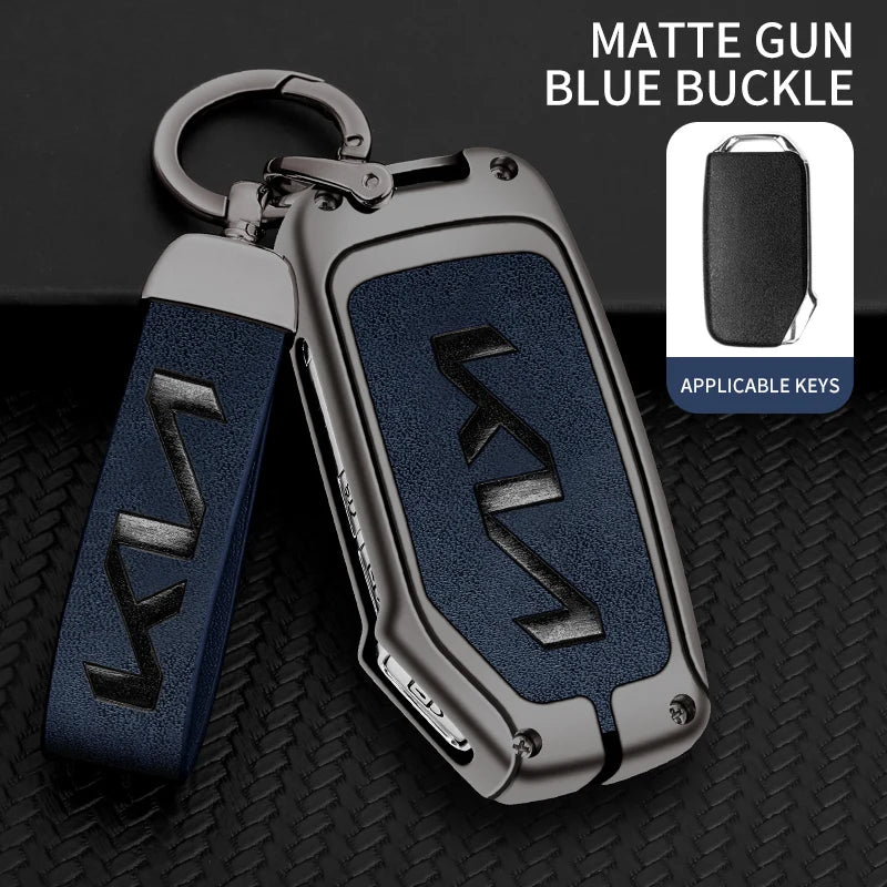 A matte gun blue buckle key case with a silver metal split ring and leather strap for applicable keys.