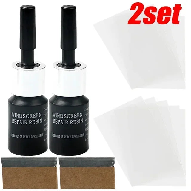 A set of black repair resin bottles and white applicator tips for windshield crack repair.