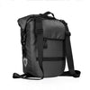 A black foldable waterproof bike pannier bag with shoulder straps.