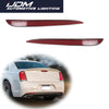 A close-up view of a red taillight reflector cover for a Chrysler 300 vehicle.