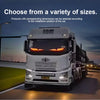 A white truck is driving on a road at dusk, with text overlay promoting choosing from a variety of sizes.