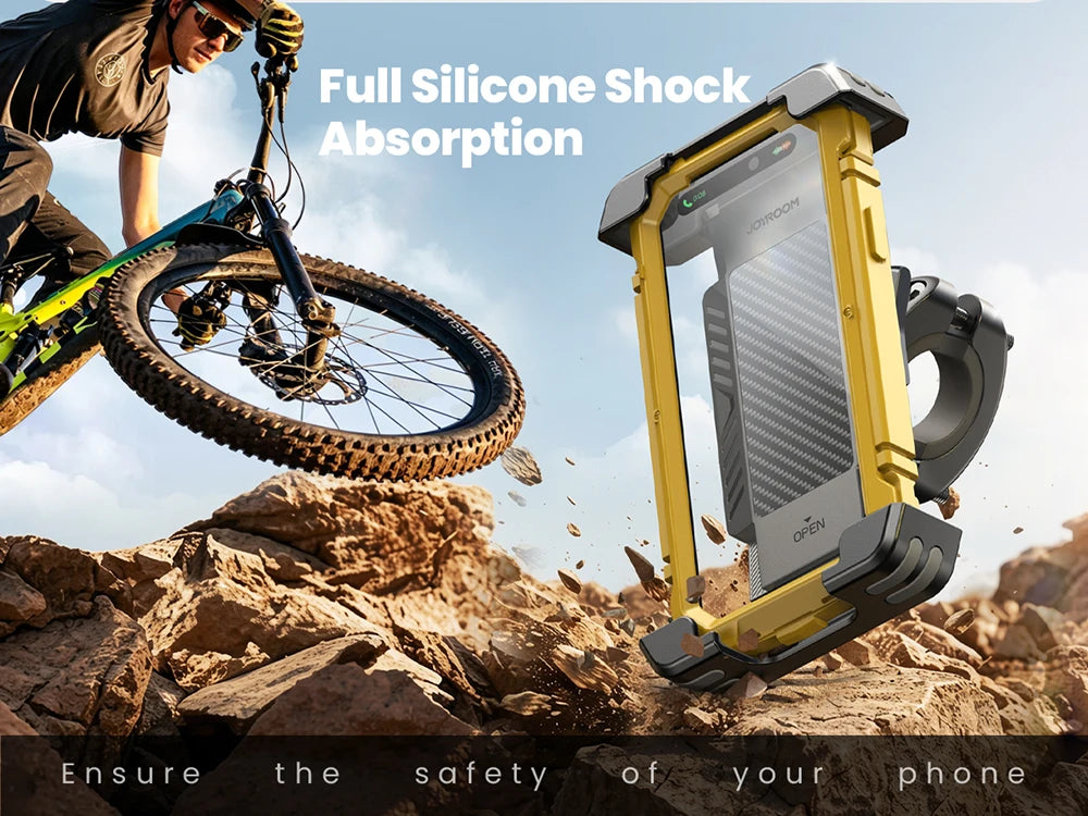 A yellow bike phone holder is shown in action, demonstrating full silicone shock absorption while mounted on a motorcycle.