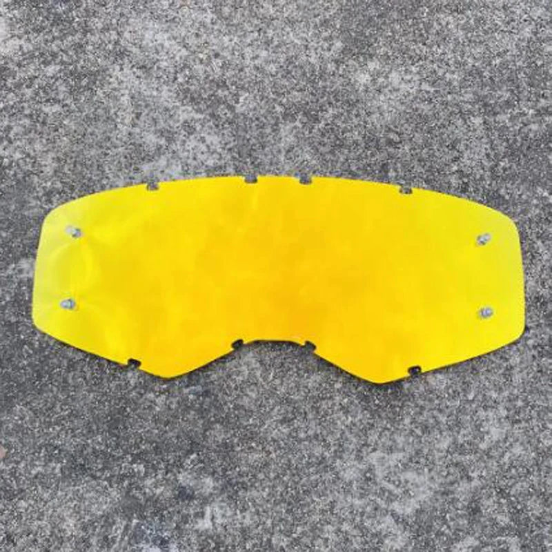A bright yellow, curved safety shield or visor for motorcycle or outdoor goggles.