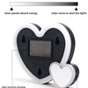A heart-shaped solar lamp with a solar panel, light sensing, vibration sensing, and a Type-C charging port.