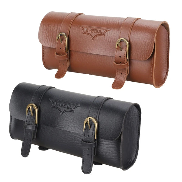 A brown leather motorcycle handlebar saddlebag with gold hardware.