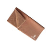A folded brown coral fleece drying towel set with the brand name ORA visible on the fabric.