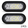 Two black rectangular LED brake and marker lights with multiple clear bulbs each