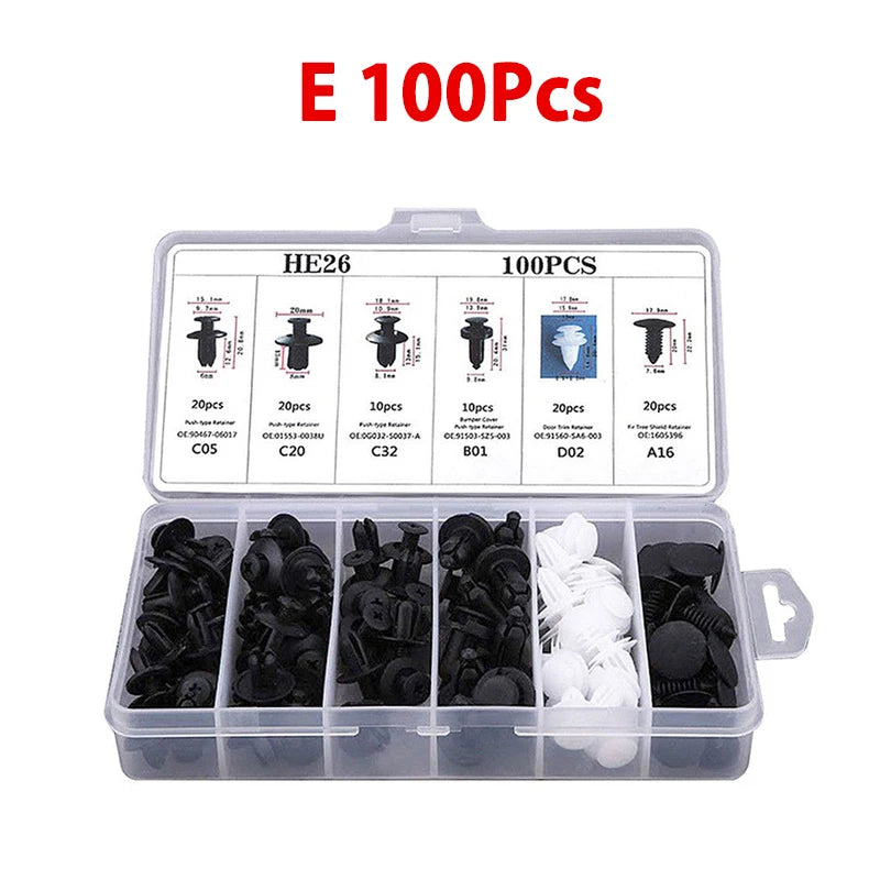 A clear plastic container holding various auto fastener clips and hardware components for trim and body repair