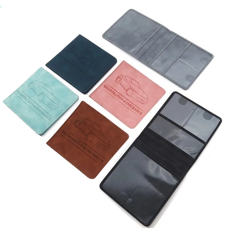 A set of six leather card holder wallets in various shades of blue, gray, and brown for ID and license.
