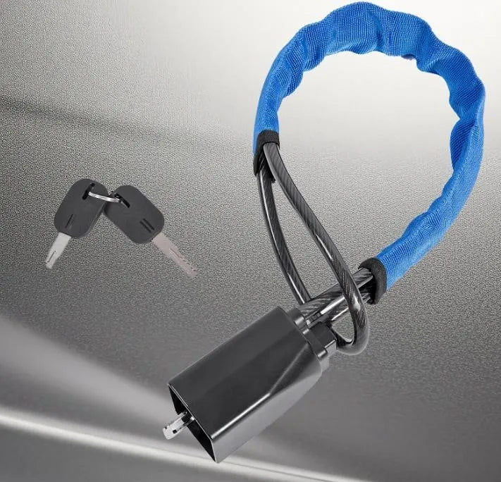 A blue anti-theft lock with a flexible cord and a metal key is shown against a gray surface.