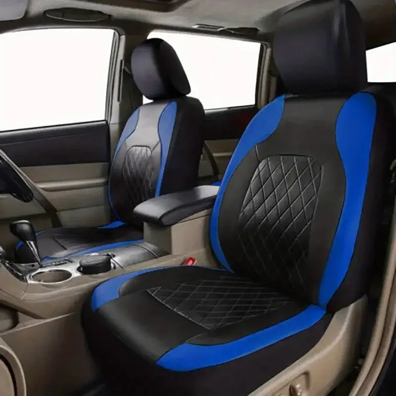 Interior view of a car seat with black and blue PU leather covers installed on the seats.