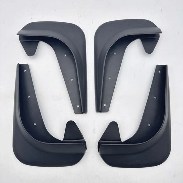 A set of universal mud flaps for car wheel protection, shown in dark gray plastic.