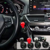 Close-up view of an all-metal cylindrical car start button accessory with various colored and metallic finishes.