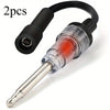 Two automotive spark plug ignition tester kits showing the electrical connector and metal plug.