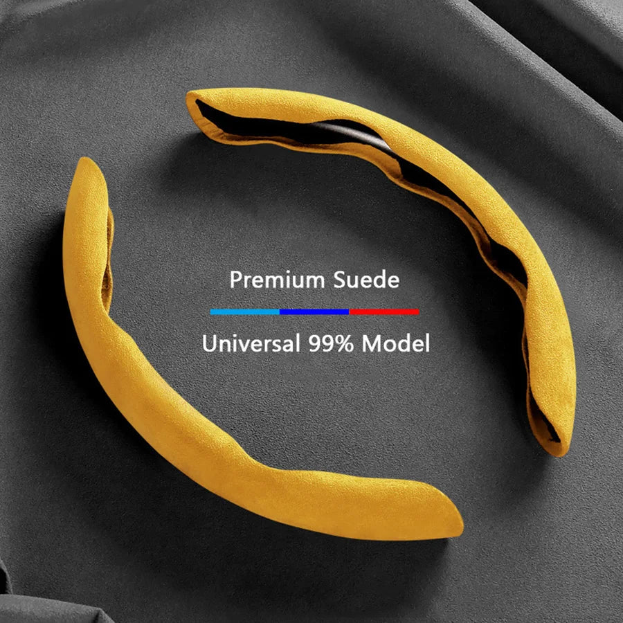 A yellow suede steering wheel cover is shown against a dark background.