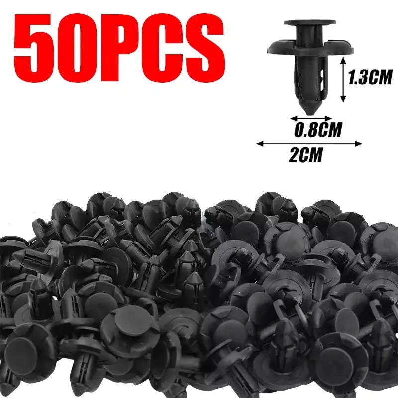 A pile of black 8mm plastic bumper clips for automotive use.
