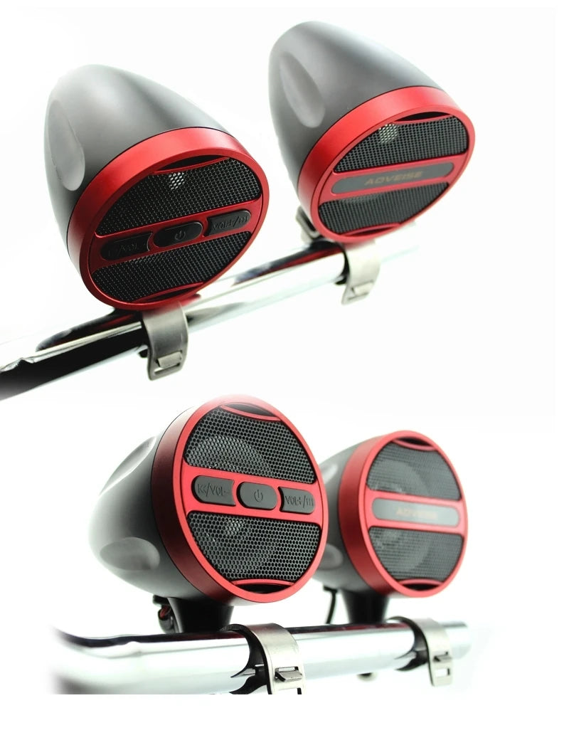 A pair of black and red motorcycle Bluetooth speaker systems mounted on a silver bar.