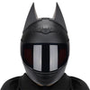A black full face motorcycle helmet with detachable horns shown from the front.