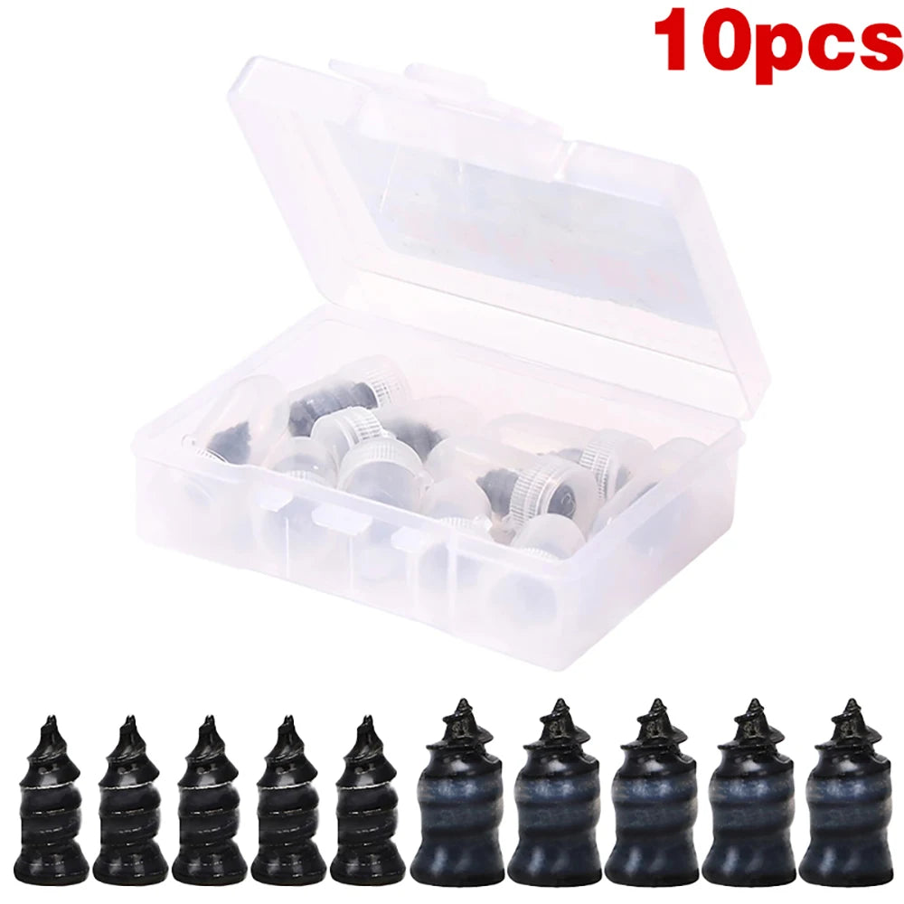 A set of ten black tire repair nails and a screwdriver are displayed in a clear plastic box.
