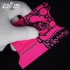 A pink magnetic suction car vinyl wrap film scraper kit is shown next to a white glove.