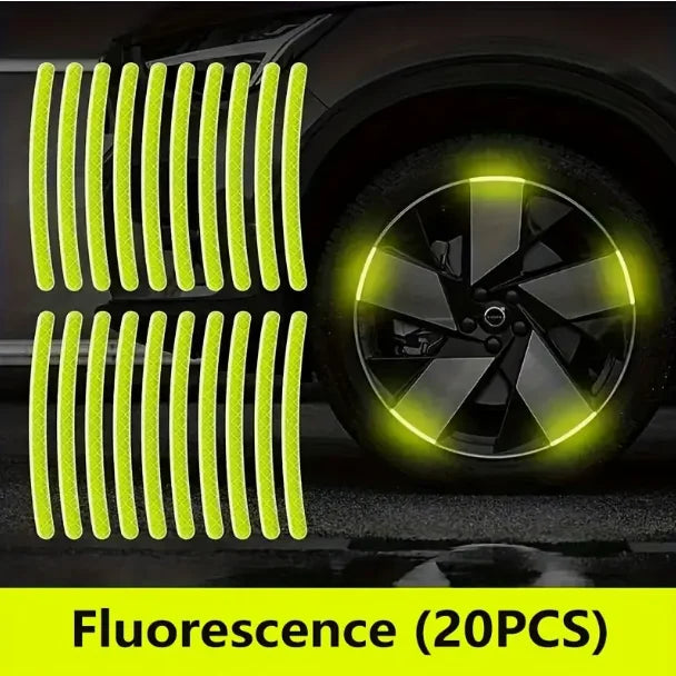 Fluorescence wheel hub decals with bright yellow light visible on a car wheel.