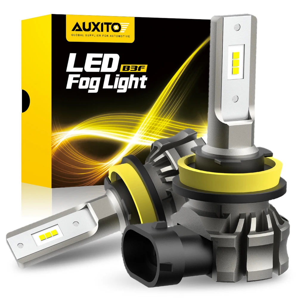 A packaged LED fog light assembly with a silver housing and yellow lens, shown next to its box.