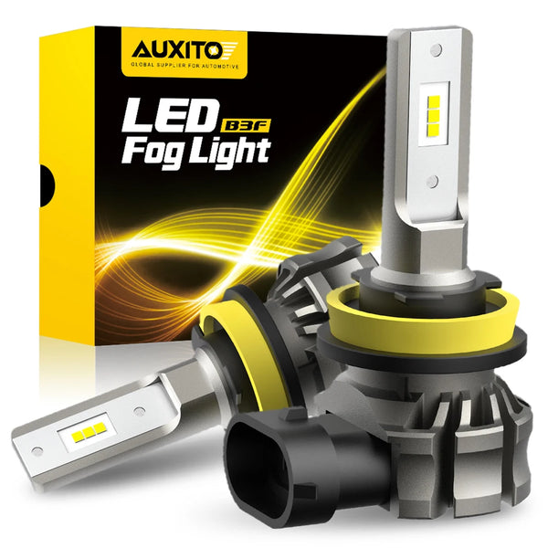 A packaged LED fog light assembly with a silver housing and yellow lens, shown next to its box.