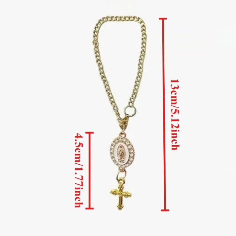 Gold chain rosary necklace with a pendant featuring a religious figure and a cross.