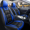 A close-up view of a blue and black leather car seat with custom covers installed in a vehicle interior.
