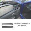Carbon fiber trim piece for Dodge Charger interior door panel, made of ABS material.