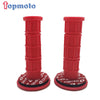 A pair of red gel rubber handlebar grips for dirt bikes.