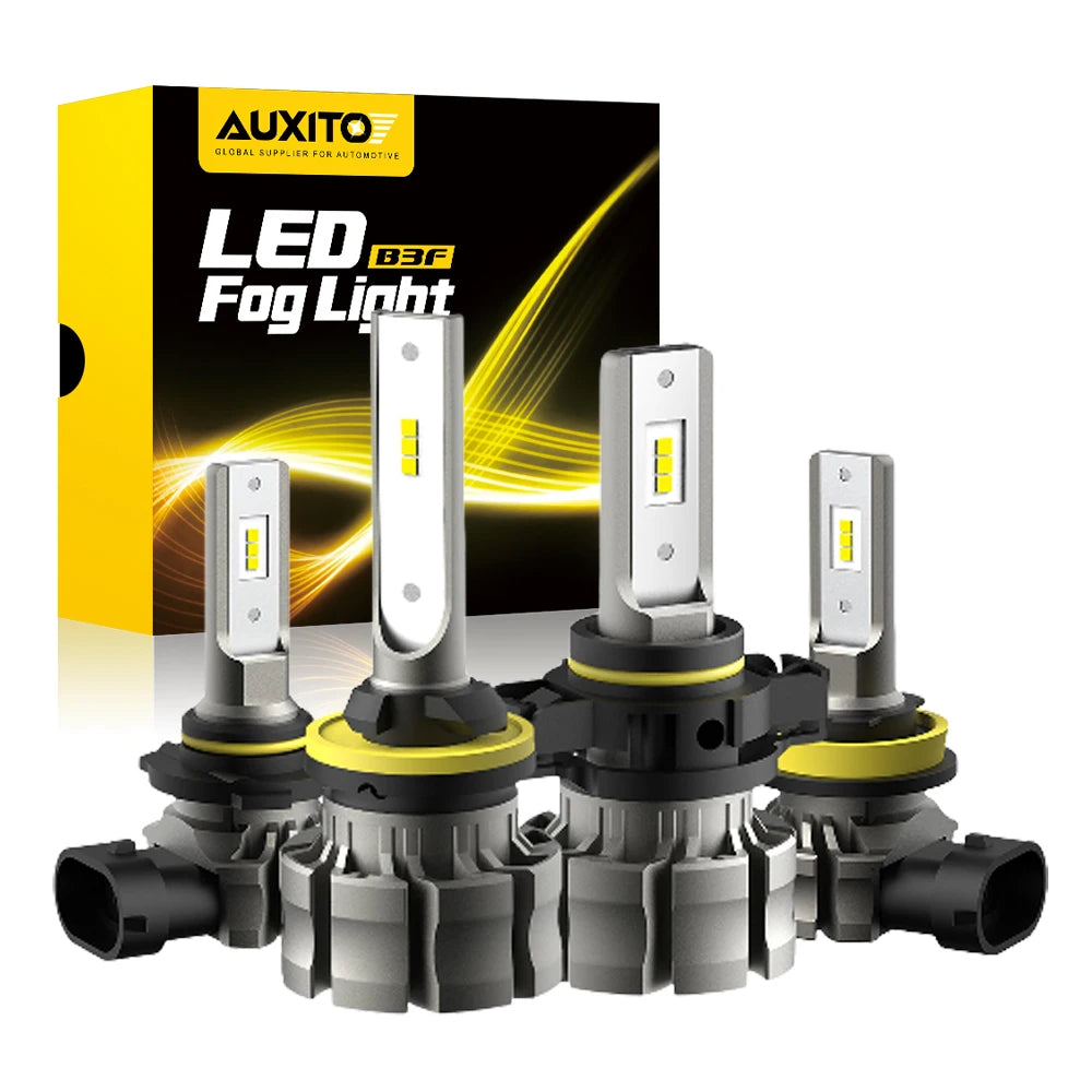 A set of LED fog light bulbs for automotive use, featuring amber yellow light and a silver housing.