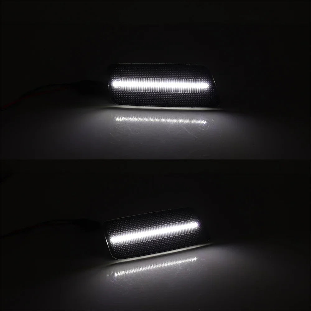 Close-up of an LED side marker turn signal light illuminating a surface.