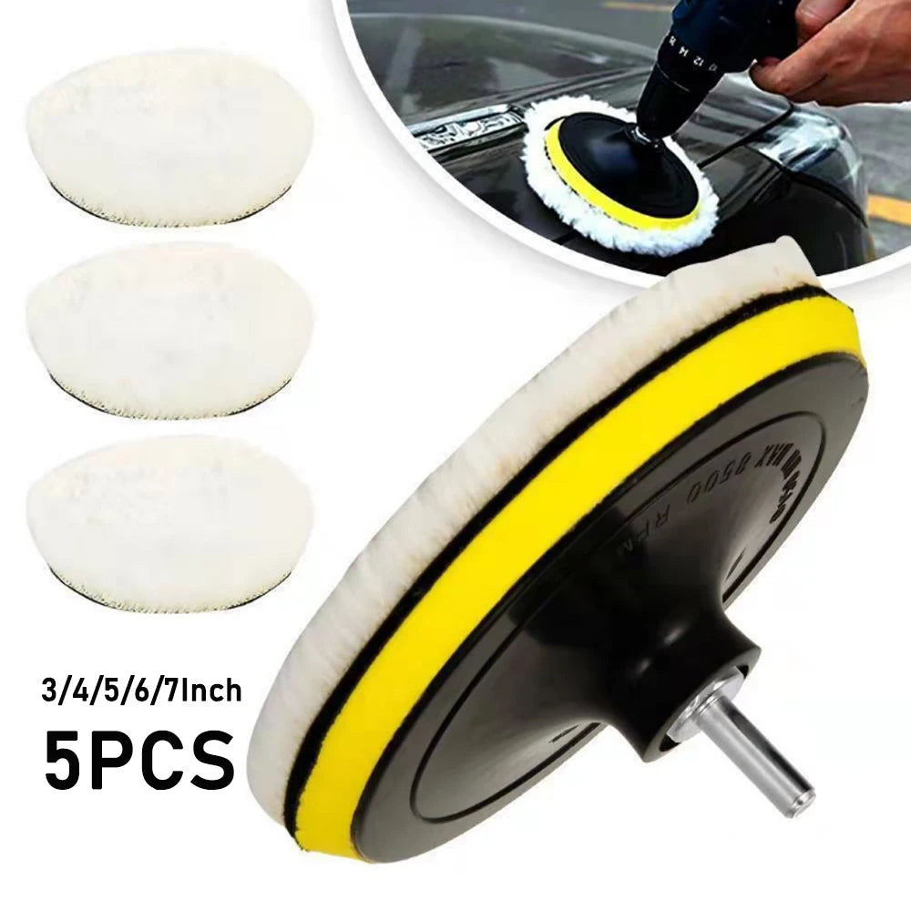 A set of five black and yellow wool buffing pads for car polishing and detailing.